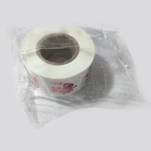 Detailed view of red Fu character sticker roll for festive gift and envelope sealing