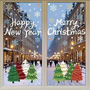 Festive Christmas window stickers with tree and snowflake patterns on a glass pane