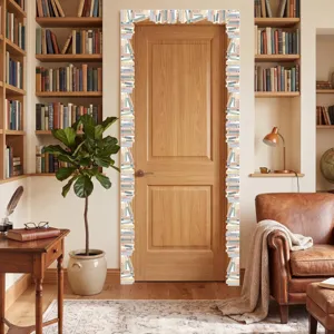 Detailed view of decorative library book border stickers applied around a wooden door frame