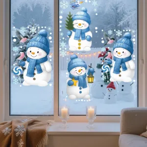 Application of cute Christmas snowman window stickers on a snowy glass window pane.