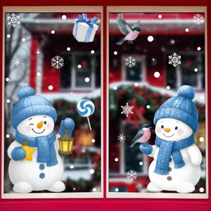 Cute snowman Christmas window stickers applied on glass for festive holiday home decor