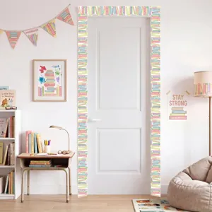 Detail view showing book spine border stickers applied around a white room door