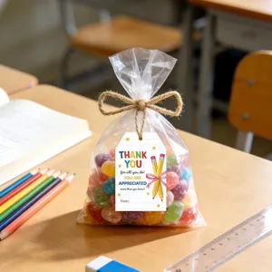 Thank you gift tags with pencil illustrations on candy bag in classroom setting