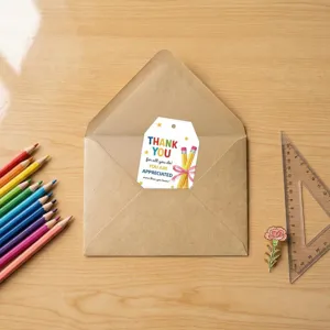 Teacher appreciation thank you gift tag with colorful text inside a kraft envelope