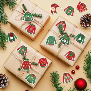 Detail view of ugly Christmas sweater stickers applied to kraft gift boxes with pine décor.