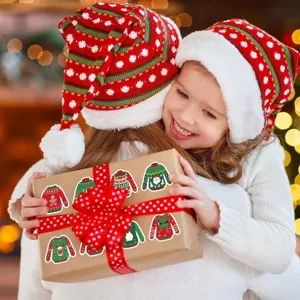 Christmas ugly sweater stickers decorating a brown gift box held by a happy child