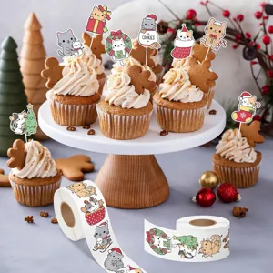 Close-up of Christmas cat stickers roll used for cupcake toppers and gift packaging