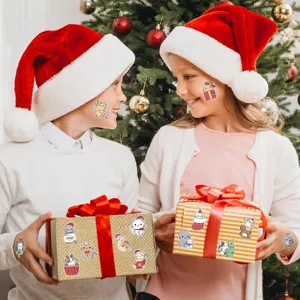 Festive cat Christmas stickers applied to gift boxes and children's cheeks.