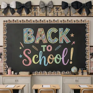 Classroom chalkboard decorated with colorful cartoon book and bow bulletin board borders.