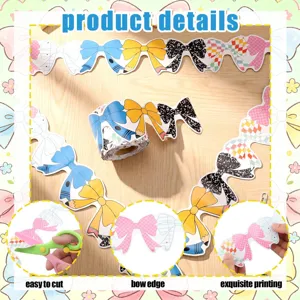 Close-up of colorful cartoon bow and pencil bulletin board border stickers being cut