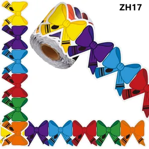Close-up detail of multi-colored bow-tie shaped bulletin board border stickers in a roll