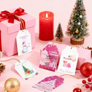 Assorted cartoon Christmas gift tags with reindeer and snowman illustrations on pink boxes
