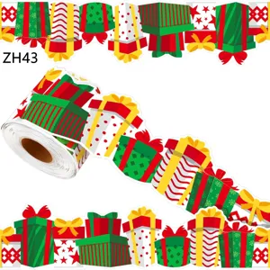 Macro view of 10m Christmas bulletin board border sticker with festive gift box patterns.