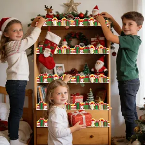 Festive Christmas gift box pattern border stickers applied to a wooden bookshelf with children