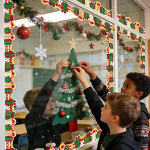 Children decorating window with Christmas gift box border stickers and felt tree.