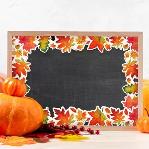 Decorative autumn maple leaf bulletin board border sticker shown on a chalkboard frame