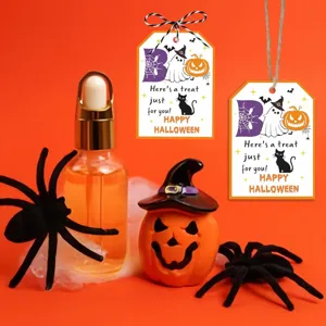 Halloween gift tags with ghost and pumpkin designs in a festive setting