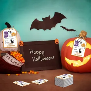 Set of 50 decorative Halloween gift tags featuring ghost and pumpkin designs with twine