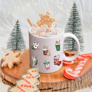 Festive Christmas watercolor stickers with gingerbread man on a white mug in a cozy setting