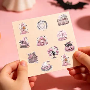 Süße rosa Halloween-Aufkleber mit Geistern und Kürbissen auf einem Bogen Papier