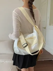 Korean style minimalist white and yellow canvas duffle bag for travel and fitness.