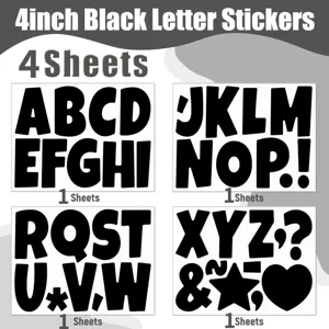 Detailed view of 4 sheets of 4-inch black vinyl letter and symbol stickers.