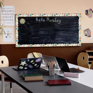 Travel themed bulletin board border sticker showing world landmarks on a blackboard