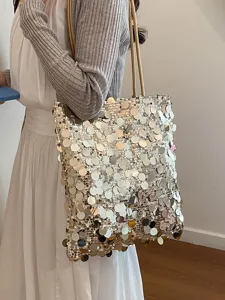 Stylish women's shimmering sequin tote bag for summer, elegant champagne gold finish