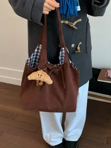 Retro brown large capacity tote bag with checkered lining and croissant plush charm
