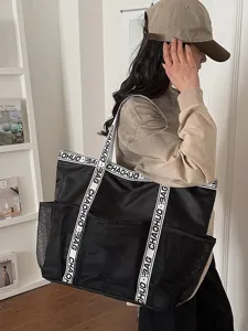 Große schwarze Pendler-Tasche mit Netztaschen und bedruckten Trägern