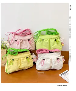 Collection of four candy-colored utilitarian tote bags with functional drawstring details.
