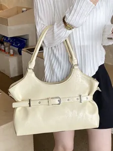 Crèmekleurige minimalistische draagtas met riem voor dames schoudertas forenzenstijl.