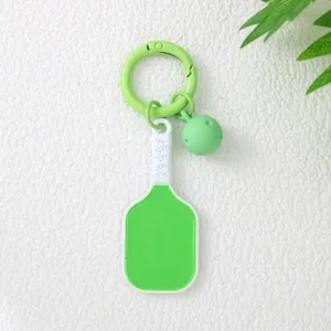 Mini porte-clés raquette de pickleball vert avec décoration de balle pour sacs de sport