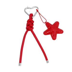 Red PU leather braided keychain with heart metal clip and star charm for bag accessories