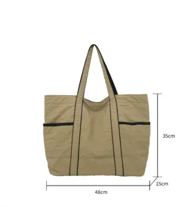 Spacious nylon tote travel bag with 48x15x35cm dimensions shown on white background
