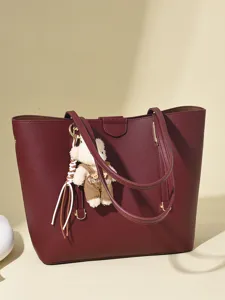 Minimalist burgundy large capacity tote bag with cute teddy bear charm for daily commute