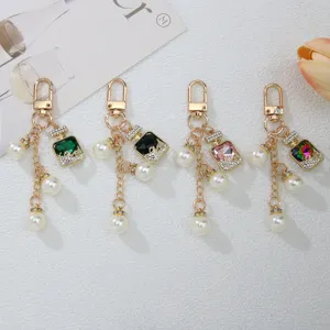 Llavero Colgante de Frasco de Perfume con Perla Artificial y Strass para Mujer Niña Adorno de Bolso Joyería Regalo
