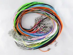 Detailed macro view of colorful waxed cotton necklace cords with lobster clasps