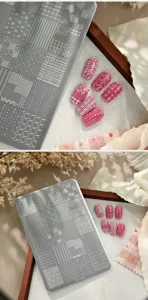 Detailed macro view of professional nail art stamping plate TG-019 with various grid patterns