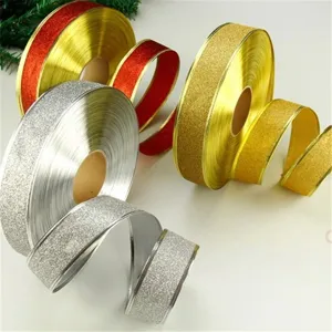 Assorted Christmas glitter ribbons in gold and silver for festive tree decoration