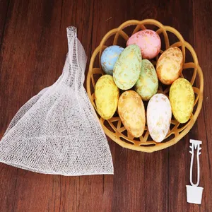 Detailed view of colorful speckled foam Easter eggs in a basket with mesh bag and tool