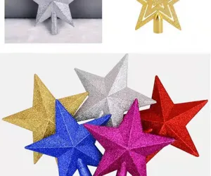Detailed view of colorful glitter Christmas tree topper stars in various colors