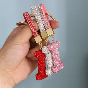 Sparkling rhinestone-encrusted letter I keychains in red, white, and pink finishes for gift