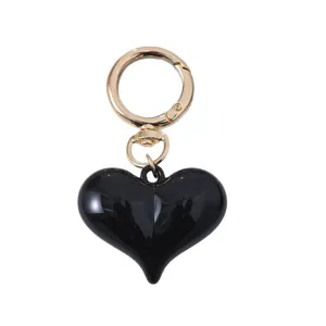 Stylish black acrylic heart keychain with gold-tone clasp for bags and car keys accessories