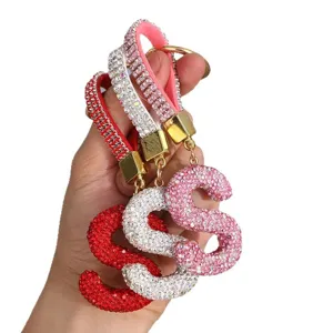 Luxurious rhinestone studded letter S keychain and bag charm for women in red white and pink