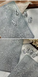 Detail shot of TG-018 nail art stamping plate with intricate floral and vine patterns