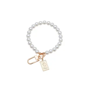 Vintage pearl keychain with gold coin pendant featuring Queen Elizabeth II portrait