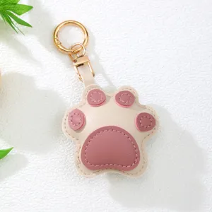 Adorable pink and beige leather cat paw keychain pendant for bags and car keys