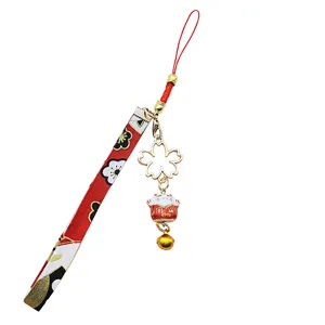 Japanese Maneki-neko lucky cat phone strap with cherry blossom charm and golden bell