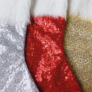 Detailed view of sparkling sequined Christmas stockings featuring soft white faux fur trim.